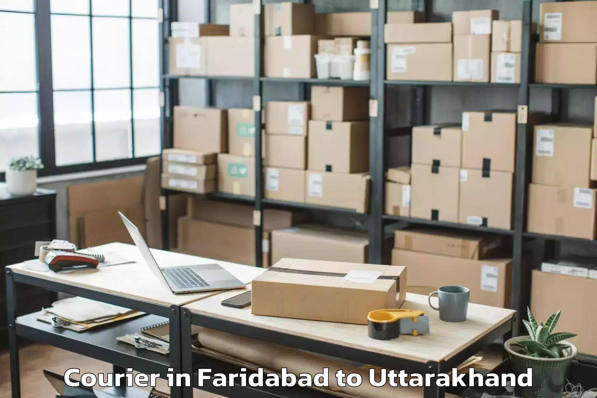 Faridabad to Uttarakhand Aawasiya Vishwavid Courier